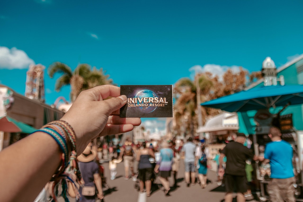 Holding a Universal Orlando Resort card in one hand