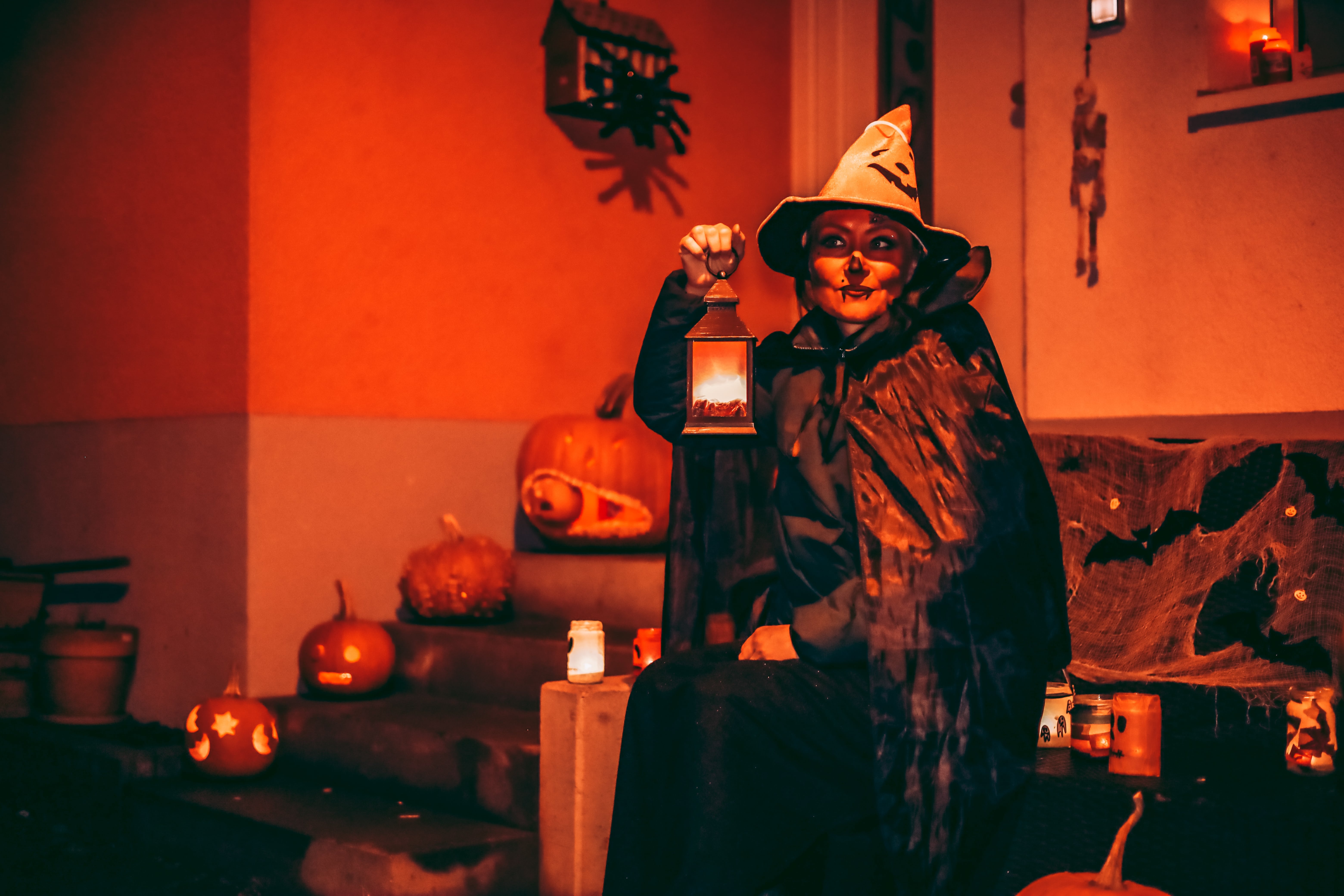 woman in witch costume at Halloween night