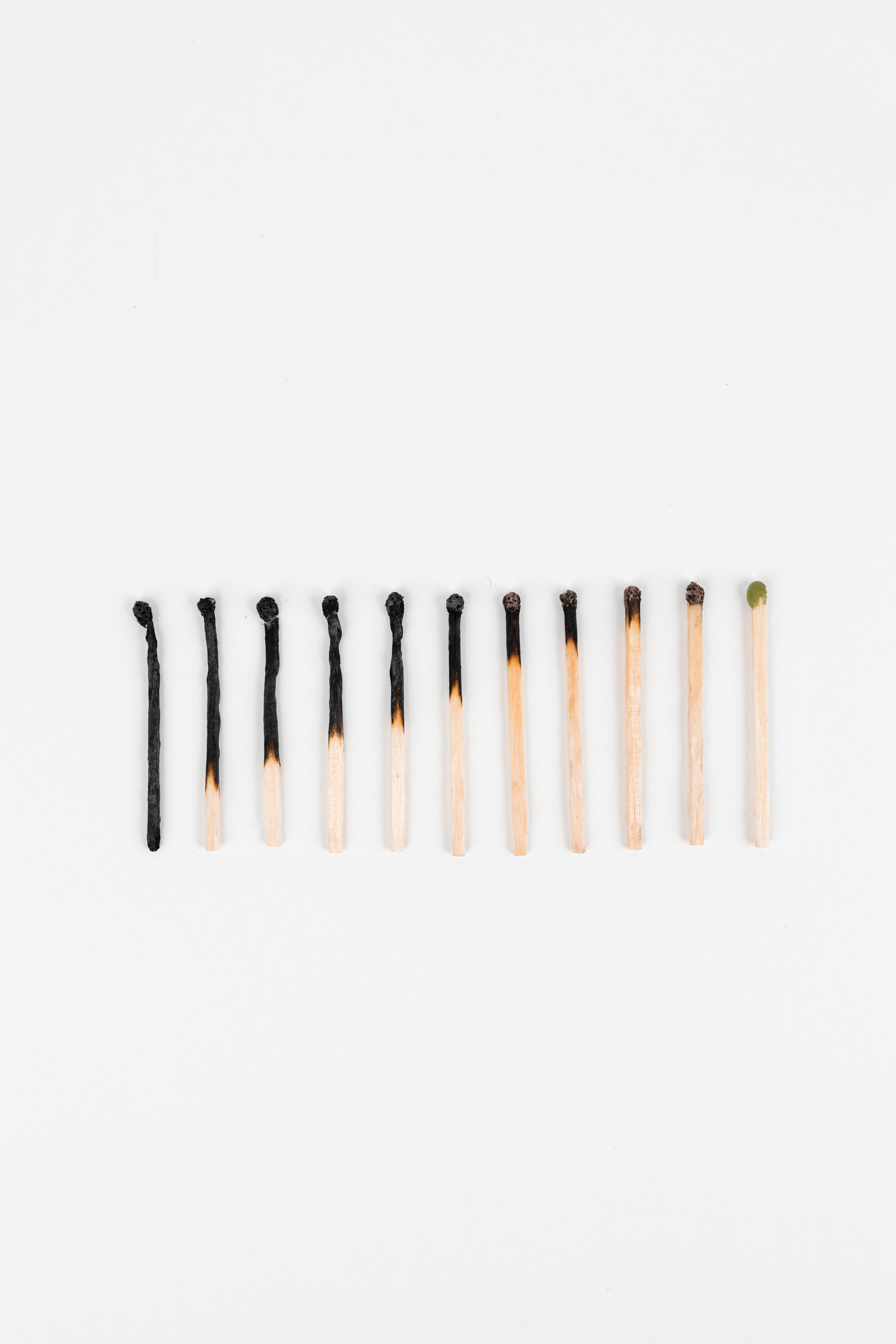 Burnt matches on a white table